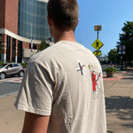Man wearing The Air Rat Graphic Tee on a city street